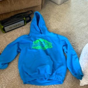 It a women hoodie that is blue and green letters also a large